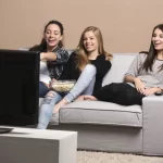 depositphotos_108415562-stock-photo-girls-watching-movies